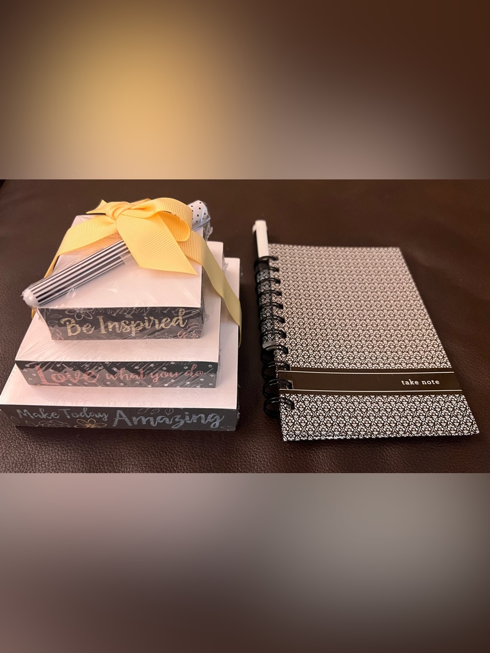 Tower of Pads and Spiral Notebook